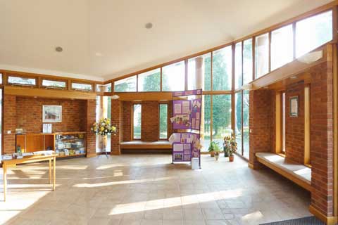 Interior of Our Lady of Lourdes Church gathering space designed by Darren Mayner